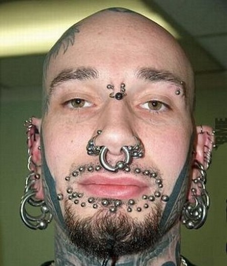 eyeball piercing. tattoos and body piercing.